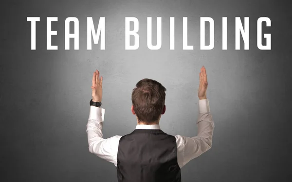 Vista Trasera Hombre Negocios Con Inscripción Team Building Poderoso Concepto — Foto de Stock