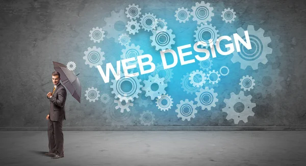 Webデザイン碑文から傘で守るビジネスマン 技術コンセプト — ストック写真