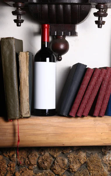 Červené víno a knihy — Stock fotografie