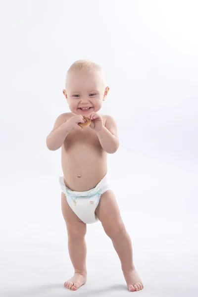 Child goes and plays in diapers — Stock Photo, Image