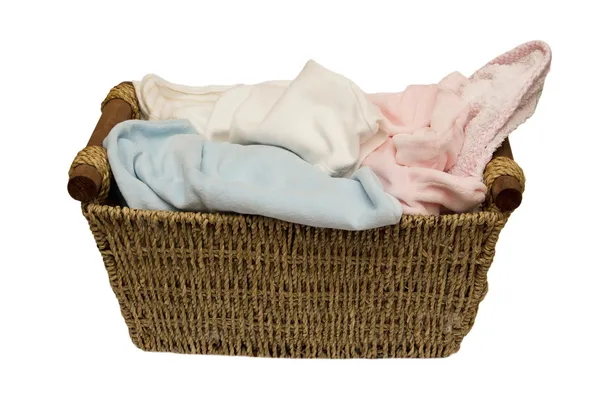 Basket with laundry against a white background — Stock Photo, Image