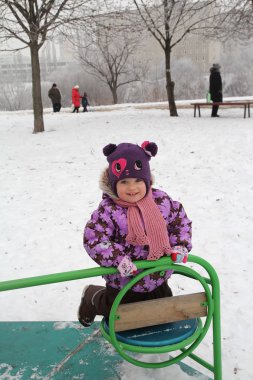 çocuk üzerinde Kış Bahçesi