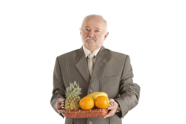 Man met vruchten — Stockfoto