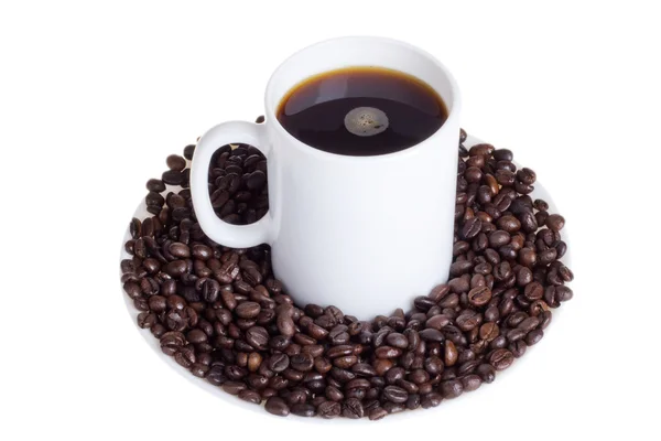 Coffee beans with a cup of coffee — Stock Photo, Image