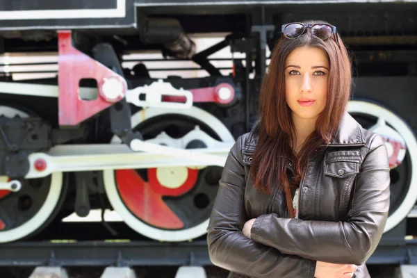 Girl and locomotive — Stock Photo, Image