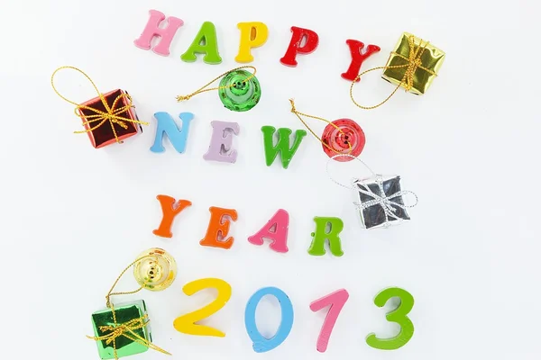 Resin Happy New Year put word and Gift — Stock Photo, Image