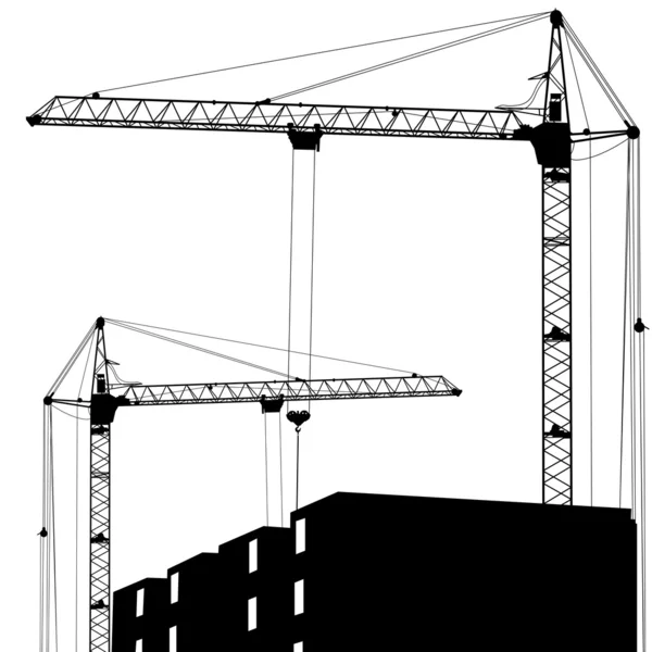 Silhouet van twee kranen werken op het gebouw — Stockfoto
