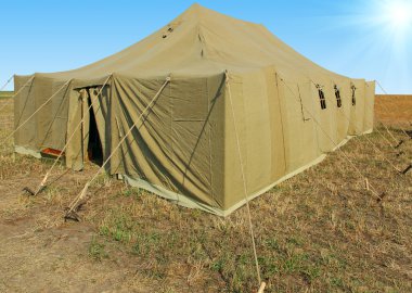 Very big military tent in the field clipart