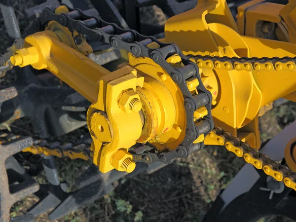 Large chain drive on a seed separator machine. — Stock Photo, Image