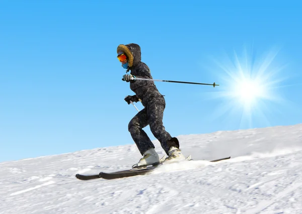 Junge Frau beim Skifahren — Stockfoto