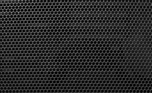 Métal trou grille fond trou noir — Photo