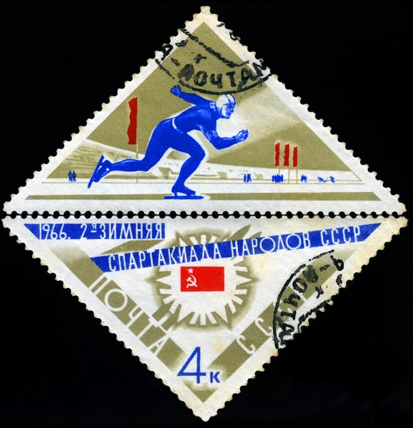 URSS - intorno al 1966: un timbro postale stampato in URSS illustrato pattinatore, de — Foto Stock