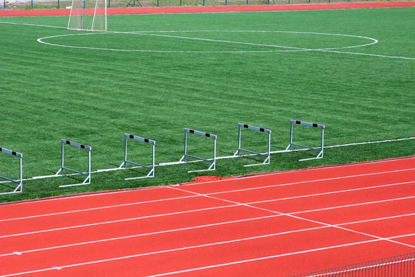 Campo di calcio verde erba artificiale con linee bianche — Foto Stock