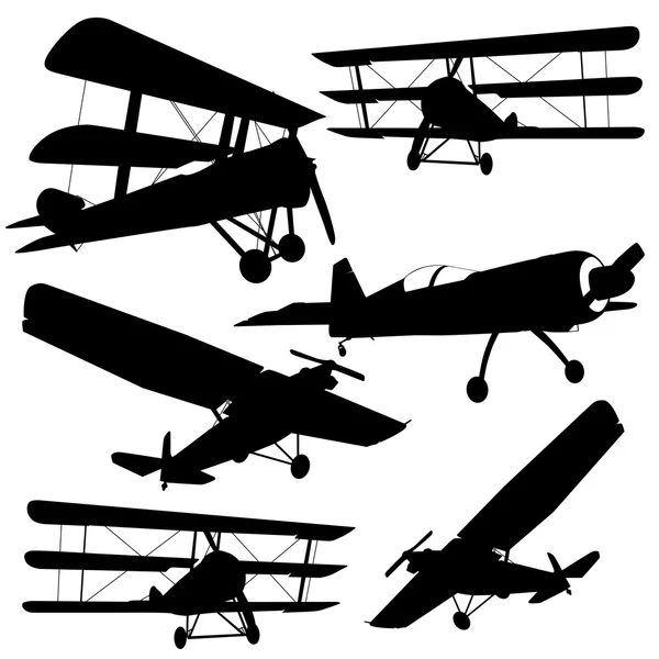 Collection of different combat aircraft silhouettes. vector ill — Stock Vector
