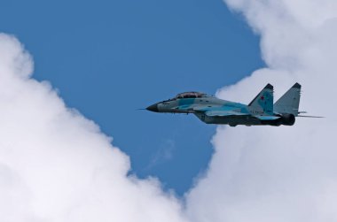 Moscow Russia Zhukovsky Airfield 25 July 2021: aerobatic MiG-35 perfoming demonstration flight of the international aerospace salon MAKS-2021. clipart