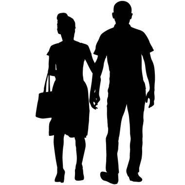 Siluet adam ve kadın el ele yürüyorlar.