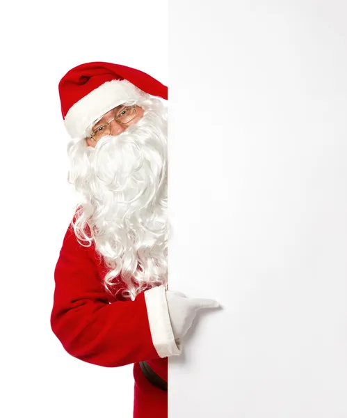 Babbo Natale che punta su un banner vuoto — Foto Stock
