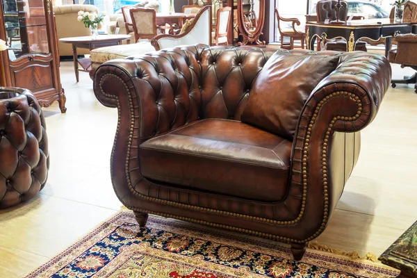 Classic leather armchair in a furniture store — Stock Photo, Image