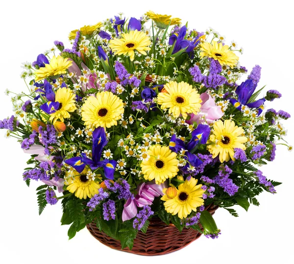 Natural gerberas and irises in a basket — Stock Photo, Image