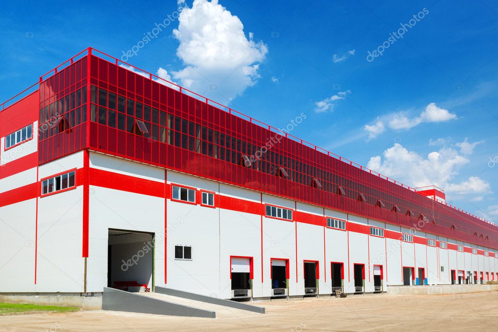 Warehouse on a background of blue sky