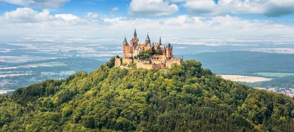 Hohenzollern Castle on mountain top, panoramic view of German burg like medieval castle, Germany. It is landmark in Stuttgart vicinity. Landscape of Swabian Alps with Gothic castle, nice skyline.
