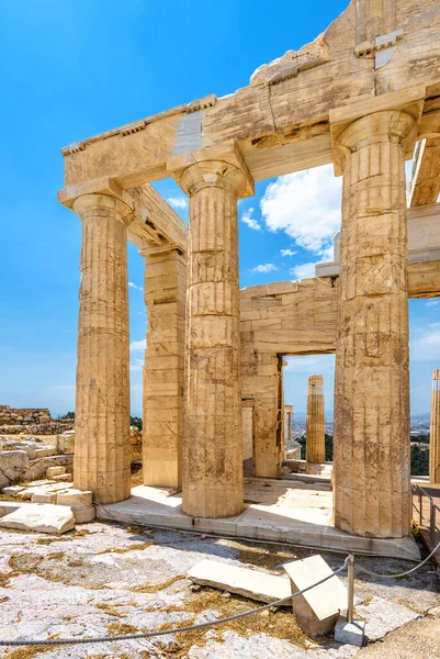 Ancient Greek ruins on Acropolis of Athens, Greece, Europe. Acropolis is top landmark of Athens. Remains of Propylaea palace, monument of Antique. Concept of civilization, past and old Athens history