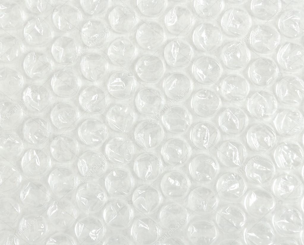 Plastic foam cushioning packing material. Stock Photo by ©kozaksalo