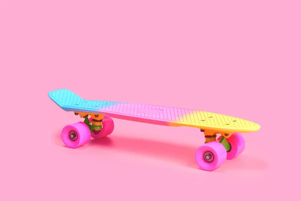彩虹塑料竹板滑板，粉红色背景隔离 — 图库照片