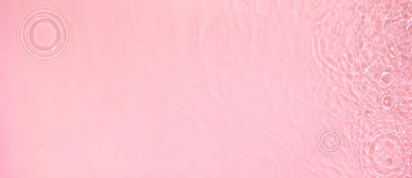 Banner background transparent pink clear water surface texture — 图库照片