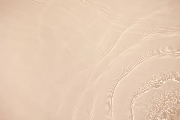 Прозора бежева кольорова прозора спокійна текстура поверхні води Ліцензійні Стокові Фото