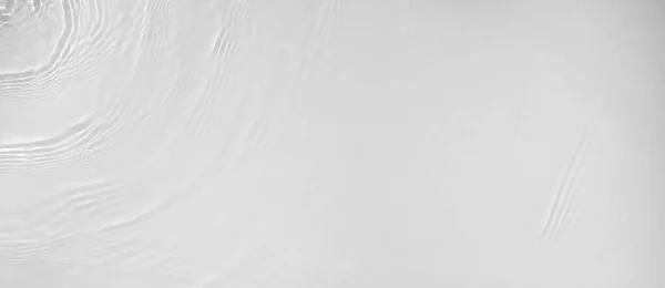 Transparentní bílá barva jasné klidné vody povrch textury Royalty Free Stock Fotografie