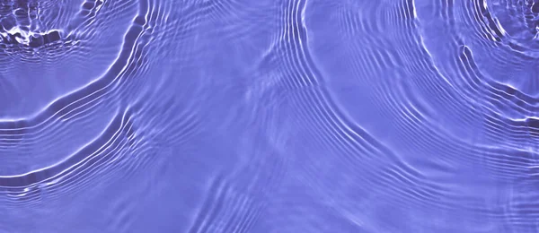 Transparentní fialová barva jasné klidné vody povrch textury Royalty Free Stock Obrázky