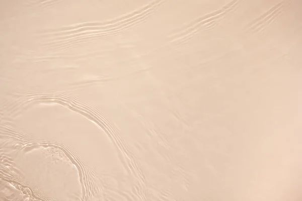 Transparente beige color claro calmado textura de la superficie del agua —  Fotos de Stock