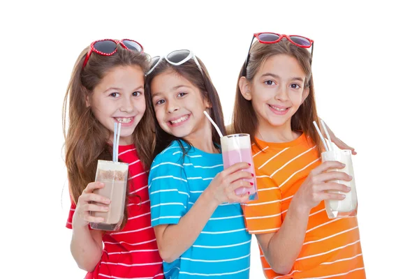 Children drinking milk drinks — Stock Photo, Image