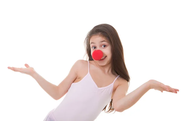 Criança com nariz de palhaço vermelho — Fotografia de Stock