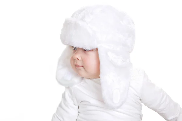 Toddler in white fur winter hat — Stock Photo, Image