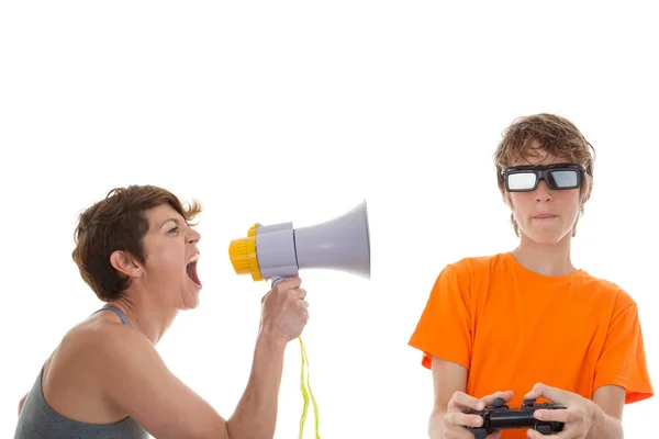 Angry mother of teen playing computer games — Stock Photo, Image