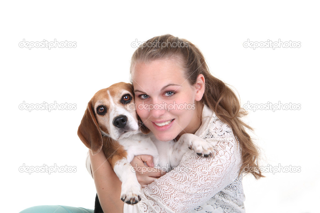 owner hugging pet Beage dog