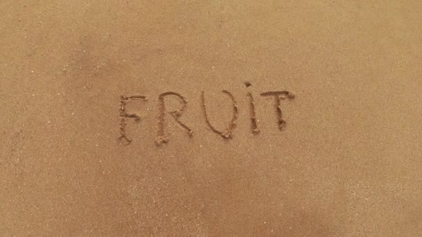 Fruit Lettering Warm Sand Washes Away Sea Water Sunny Day — Stock Video