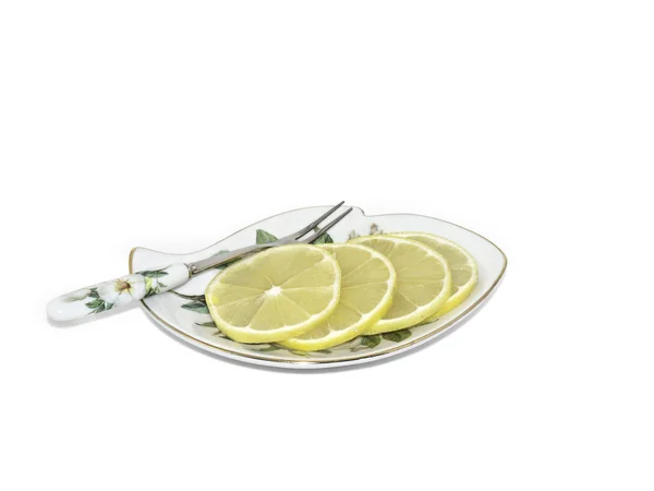 Limão em uma chapa — Fotografia de Stock
