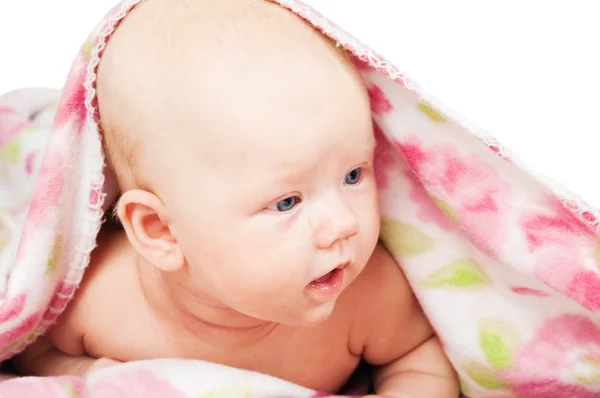 Little baby under multicolored towel — Stock Photo, Image