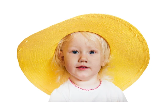 A little girl in a yellow straw hat — Stock Photo, Image