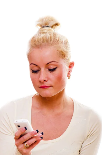 The young woman talks by a mobile phone — Stock Photo, Image