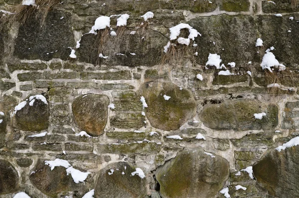 Estructura de un viejo muro de piedra, de cerca —  Fotos de Stock