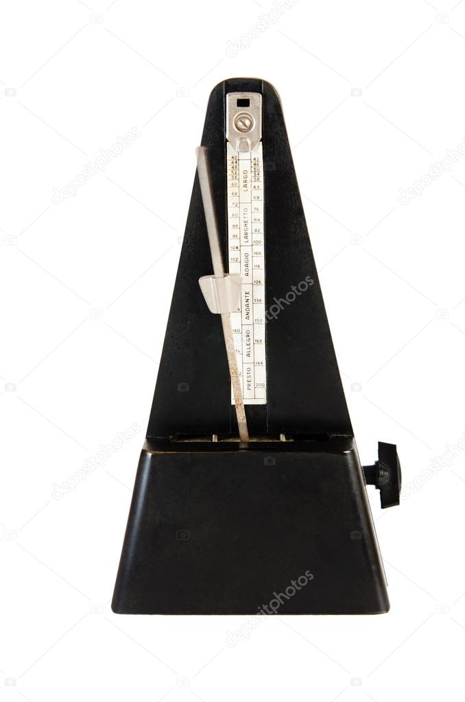 Old metronome it is isolated on white