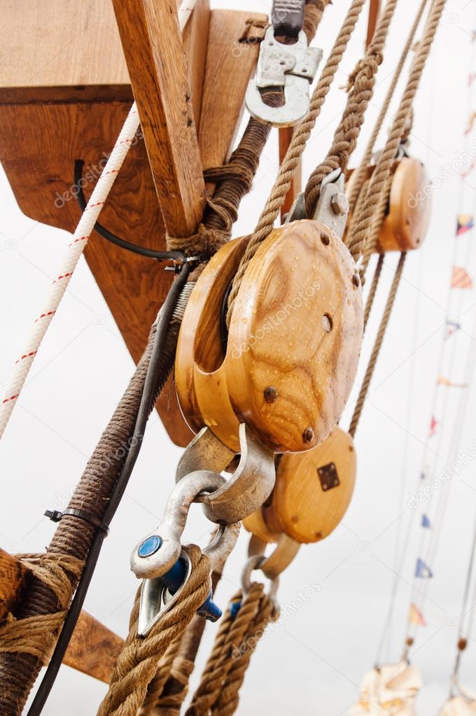Ropes and wooden tackle blocks of an sailing vessel