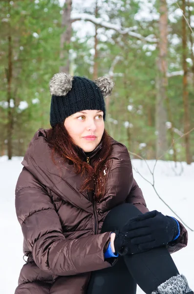 Portrait of the charming young woman in winter outdoors — Stock Photo, Image