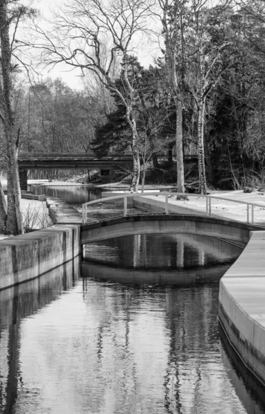 Bridge across the canal in the spring — Stock Photo, Image