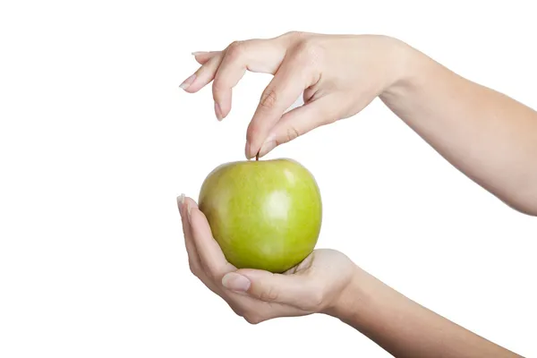 Pomme verte dans les mains Images De Stock Libres De Droits