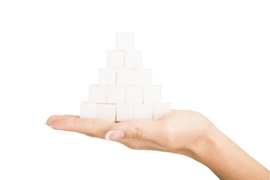 avuç içinde beyaz zemin lumpy şeker Piramidi